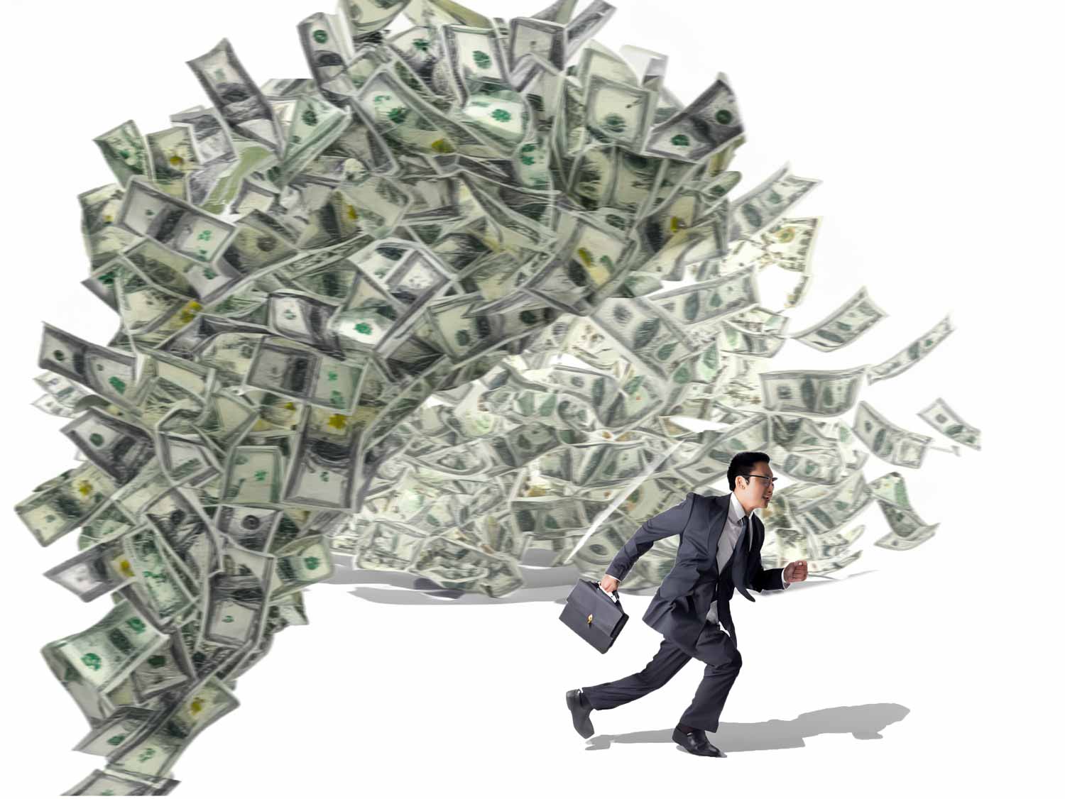 Businessman chased by a tornado of dollar bills